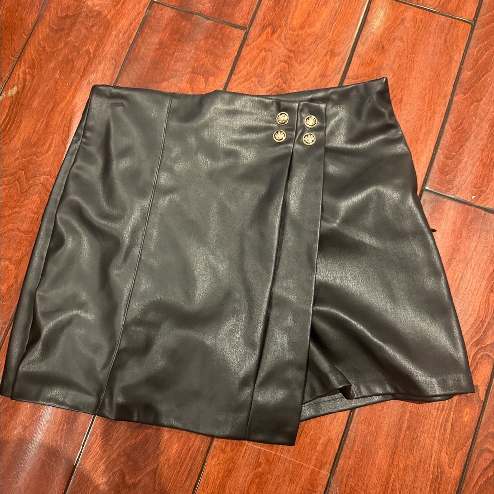 Zara black leather score with gold buttons